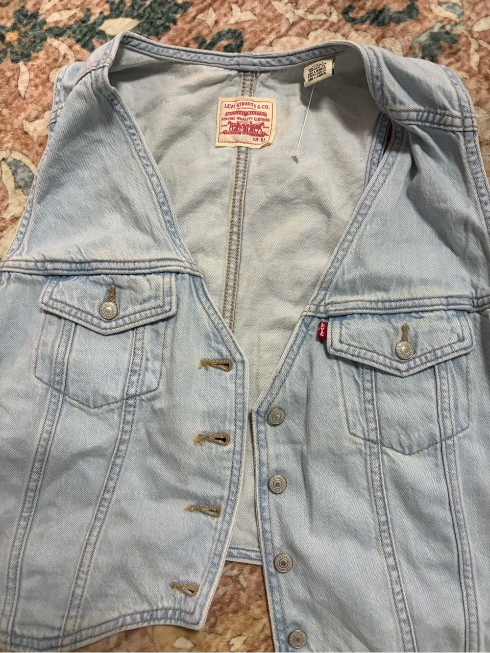 Women’s Levi’s light wash button front vest